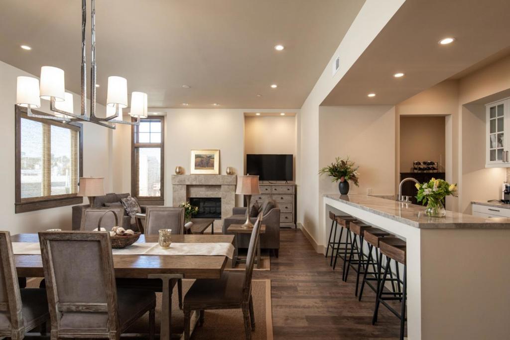 In the heart of the historic and vibrant Cannery Row district in Monterey, this luxury residence is one of four units designed by renowned architect, Eric Miller. Featuring 3 bedrooms, 2 bathrooms, in-unit laundry, and secure gated garage parking with elevator. This top floor unit features a private large rooftop terrace with outdoor kitchen and wide bay views perfect for entertaining. Boasting premium exterior and interior finishes, hardwood floors, 10 ft high ceilings, state of the art security system and central heat and A/C. Close proximity to Cannery Row, the aquarium, world famous restaurants of Monterey, Monterey Plaza Spa, beaches and the coastal recreation trail. This sophisticated turnkey residence is a rare find in this prime location.
