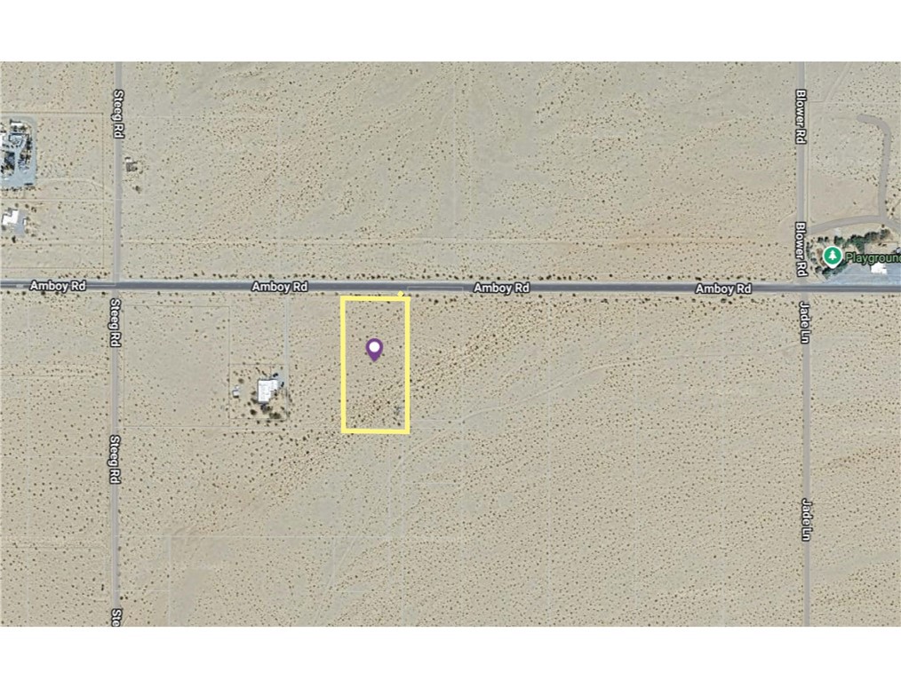 Level lot on paved Amboy Rd with overhead power. Twentynine Palms is a scenic desert community near Joshua Tree National Park. Lots of vacation homes and air bnb rentals in the area. Easily accessed from the Victorville Apple Valley area and from Palm Desert area. Best priced lot on a paved road with overhead power.