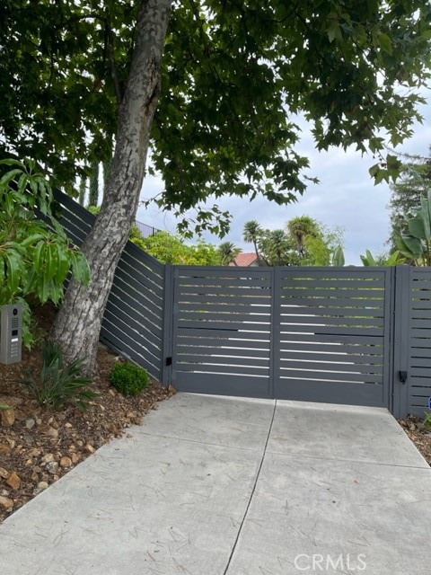Tastefully remodeled Southshore Hills single story home featuring complete privacy along with panoramic views. A long gated driveway leads to this perfectly situated property that feels so far away from everything and yet is so close to all amenities. Living room with wood floors and brick fireplace, open kitchen complete with top appliances, family room and dining area. Four bedrooms, including a master that looks out to the spacious and beautifully landscaped entertainer's yard and of course, the magnificent views. The 2 car garage / office has been converted back to a garage but can be used for multiple purposes. Ready for those who want to enjoy not only the vivid sunsets, but also the best of the Westlake Village lifestyle.