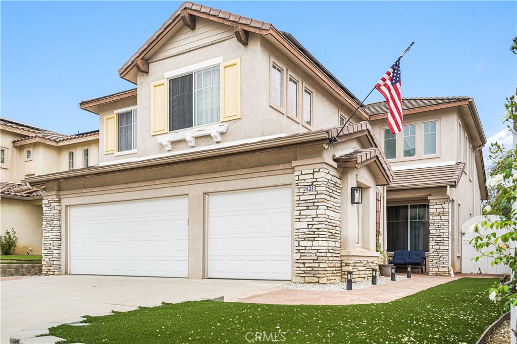 This beautifully upgraded Simi Valley home offers 4 bedrooms, 2.5 bathrooms, and 2,271 square feet of living space designed for both entertaining and everyday retreat-style living. Soaring two-story ceilings welcome you into the foyer and living room, creating an open and inviting atmosphere filled with natural light. The family room features a stunning stone fireplace, while the remodeled kitchen includes custom pull-out cabinetry, granite countertops, stainless steel appliances, and a designer backsplash. Enjoy meals in the formal dining room or breakfast nook with sliding doors leading to the backyard. Upstairs you’ll find four spacious bedrooms, including the primary suite with a large walk-in closet and spa-inspired bathroom featuring dual sinks and a luxurious shower. Step outside to a resort-style backyard with a sparkling pool and spa with waterfalls, an outdoor bar with BBQ, sink, and refrigerator, and a cozy firepit. With open space behind and an adjacent lot with a beautiful oak tree, you’ll enjoy exceptional privacy. Additional highlights include a large laundry room, three-car garage, and energy-efficient solar system with a fixed monthly fee of $231. Located in the desirable White Oak Creek community with low HOA dues of $77/month and offering easy access to freeways, shopping, and a short commute to the San Fernando Valley, this home has been impeccably maintained and is ready for you to move right in.