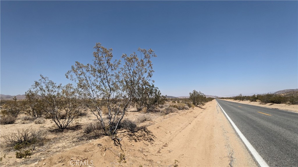 Probate Sale....Agents: Go to the MLS private remarks for additional information...This is a vacant lot in Landers and on Landers Lane. There are homes in the community and paved roads to get to the lot. 19.12 acres / 832,867 sqft approximately..These lots are also close to Yucca Valley / Joshua Tree where there is shopping and site-seeing....The GPS coordinates, Lat/Lon: 34.246111, -116.393244, will get you to the center of the street in between both lots for sale. The other lot for sale is APN: 0631-061-64. It is approximately the same size as the other but directly across the paved road....Do not rely on our directions or lot coordinates. Do your own plotting with your GPS for accuracy.