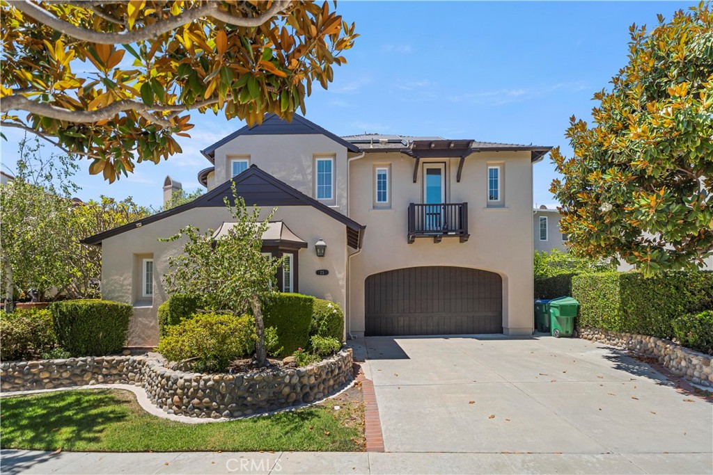 Welcome to this beautifully upgraded 4-bedroom, 3-bathroom single-family home offering 2,918 sqft of elegant living space. Tucked away in a quiet interior location of the community, this is the rare home on the street that features its own private gated front yard—an ideal and safe space for children to play or for quiet outdoor enjoyment.Step inside to a dramatic two-story foyer that flows seamlessly into a formal dining room. The dining room is filled with natural light, thanks to charming French doors that open to a side yard patio, while also offering open access to the spacious family room. Rare two-story high ceilings in the family room create an open, airy ambiance, complemented by rich hardwood floors and plantation shutters throughout the home.The gourmet kitchen is a chef’s dream, featuring white cabinetry, granite countertops with full backsplash, a large central island for meal prep, stainless steel appliances including a built-in refrigerator, and a 5-burner cooktop. A bright breakfast nook overlooks the family room, perfect for everyday living and entertaining.Downstairs, you’ll find a full bedroom and bathroom—ideal for guests, in-laws, or as a convenient home office. Upstairs includes a Jack & Jill bathroom shared by two spacious secondary bedrooms, each offering ceiling fans, wide closets, upgraded wainscoting, and fresh paint.The generous primary suite features abundant natural light, dual vanities, a soaking/jetted tub, walk-in shower, and a large walk-in closet. A versatile loft space on the second floor provides the perfect setting for an office or playroom, and the laundry room is conveniently located upstairs as well.Enjoy the tranquil backyard retreat complete with a built-in BBQ, lattice patio cover, and a peaceful water feature—perfect for outdoor gatherings or relaxing evenings.Additional highlights include:Full home repiped with durable PVC piping (replaced old copper pipes)?3-car split garage with epoxy flooring,Low HOA and low property tax,Quiet interior location with no street noise?This move-in ready home offers luxury, practicality, and privacy—all in one perfect package. Don’t miss your opportunity to own this rare gem!