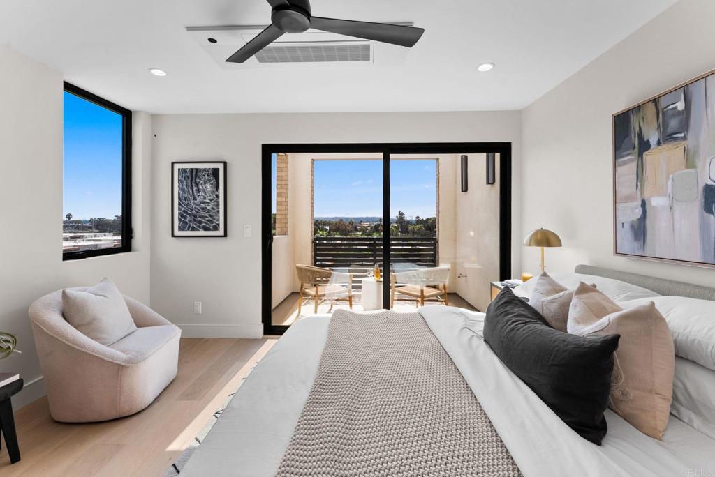 4214 Tonopah is a beautiful corner unit at Bay View 13, San Diego’s newest luxury townhome development. Set upon a bluff, the home offers breathtaking views of Mission Bay and the ocean. This 3-bedrooms and 2.5-bath unit features an open concept layout with designer touches, including solid surface quartz countertops with matching backsplash, custom inset European slab cabinets and a large kitchen pantry closet. Enjoy the elegance of brushed gold kitchen hardware, Thermador appliances, custom glass wall, floating iron staircases, engineered hardwood floors, and stylish lighting fixtures. 4214 has a bedroom on the main living level, which could double as an amazing home office. Large primary suite includes an attached bathroom, walk-in closet and a balcony.  The private garage is set up for EV charging and home comes with owned solar. Great central location provides easy access to transit, local dining, coffee shops, and the expansive Mission Bay Park, a 4,600-acre oasis perfect for biking, jogging, picnicking, and water sports. The expanded Blue Line (light rail), short walk away, connects to Downtown, UCSD, UTC, Sorrento Mesa and beyond. Call for details about buyer concessions which can be used towards a rate buy-down or home upgrades.