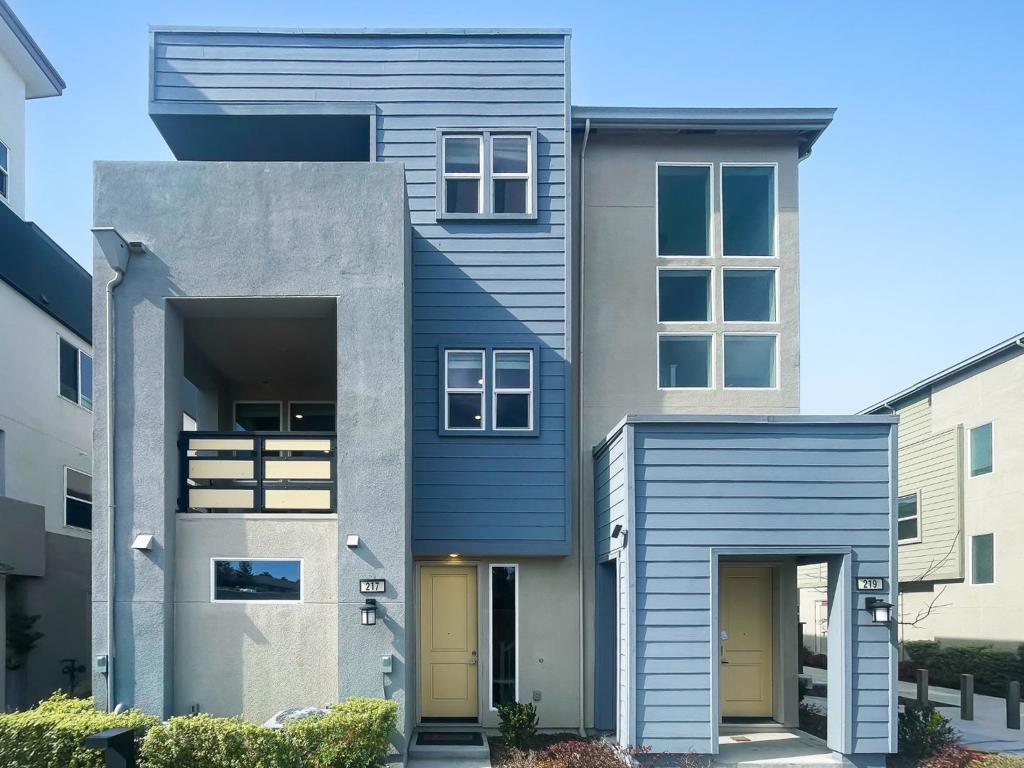 Move right into this turnkey former model home with $150K+ in designer-selected upgrades, decor, and artwork! Unlike multi-level townhomes, this two-level layout offers convenience with just one flight of stairs to your main living space. The chefs kitchen is a showstopper with a massive island, elegant chandelier, slate panel cabinetry, and top-tier appliances. The open-concept design connects seamlessly to the living room, a study nook, and a covered balconyperfect for work and relaxation. Both spacious suites feature modern en-suite baths, while the primary suite includes a double vanity, walk-in shower, and walk-in closet. A two-car attached garage, laundry area, and powder bath add convenience. Enjoy privacy with no neighbors on three sides and energy-efficient features like a 9-panel solar system, tankless water heater, and Nest control. Prime location near Costco, Lawrence Caltrain, and major tech hubs like LinkedIn, Nvidia, Google, and Apple.