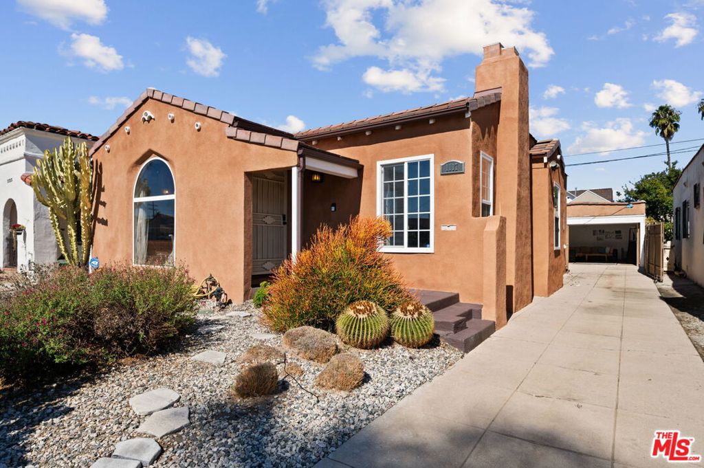 PRISTINE SPANISH GEM. Experience the perfect blend of modern living and historic charm in this remodeled 1929 Spanish jewel. Featuring 2 bedrooms, 1 bath, a versatile den, and a cozy fireplace, this home is designed for comfort. No detail has been overlooked. The fully equipped kitchen and in-unit washer and dryer offer convenience, while the large detached 2-car garage, basement, and sunny backyard provide ample space for entertainment and storage. Conveniently located near shopping, banking, worship, and dining, and easy access to public transportation and the 110 Fwy. The Vermont Knolls Historic District is significant as a large, intact concentration of Period Revival (predominantly Spanish Colonial Revival) houses and as a subdivision representing the planning practices of noted developer Walter H. Leimert. MAKE IT YOURS BEFORE THE NEW YEAR!