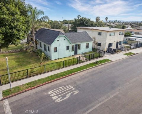 Photo of 402 E 92nd St, Los Angeles, CA 90003 (MLS # CV26048270)