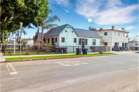 Photo of 402 E 92nd St, Los Angeles, CA 90003 (MLS # CV26048270)