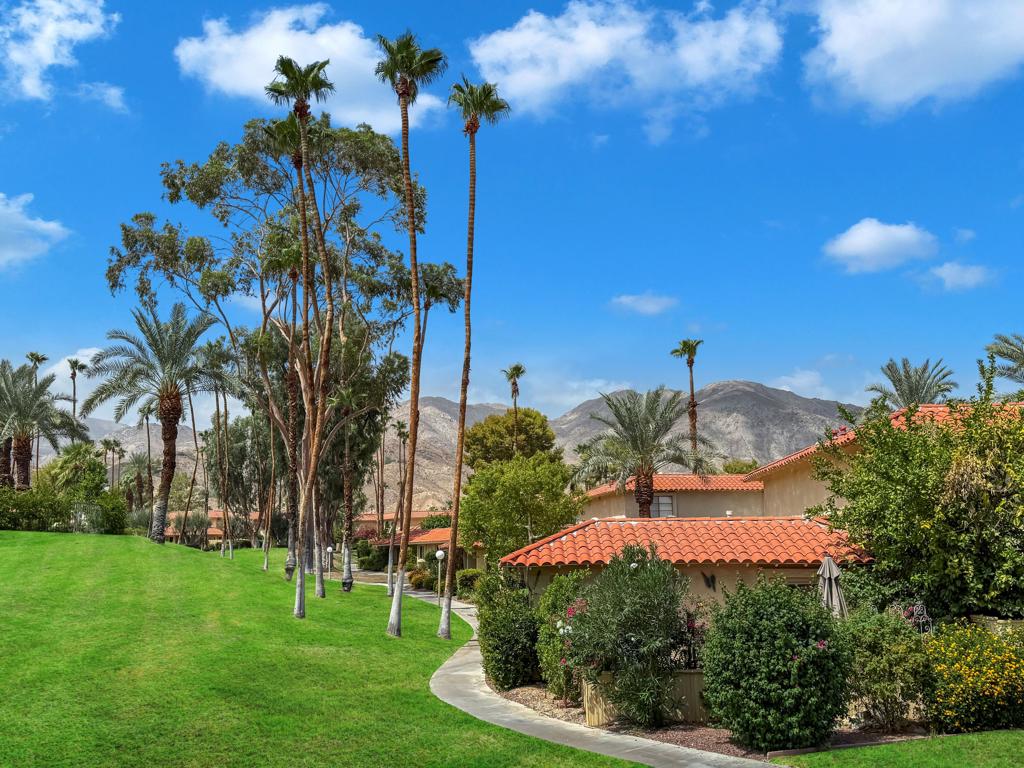 Welcome to this A unit at Deep Canyon Tennis Club- This condo is all 1 level no stairs, two parking spots in a covered carport. This is the most desirable unit at Deep Canyon 2 bedroom and den, 2 full bathrooms. This condo has some beautiful upgrades -