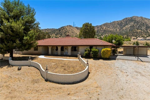 Photo of 902 Searchlight Ranch Road, Acton, CA 93510 (MLS # SR26137212)