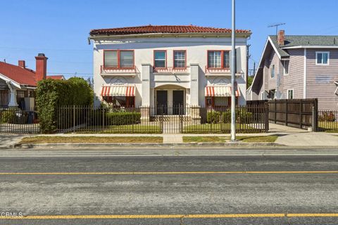 Photo of 1425 W 48th Street, Los Angeles, CA 90062 (MLS # P1-26646)