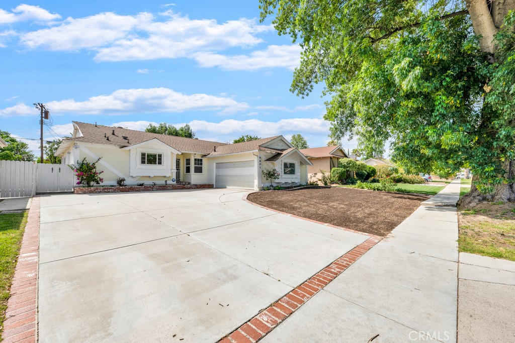 Welcome to this adorable contemporary 3 bedroom, 3 bathroom bright and open single-family home in a quiet desirable Northridge neighborhood. This beautiful home has remodeled bathrooms and kitchen. Hardwood floors in family room and in two of the bedrooms. This home comes complete with tiled family den perfect for entertainment! large dinning area, with lots of windows bringing natural light. The gorgeous kitchen has been tastefully remodeled, brand new laminate floors, newer refrigerator, dishwasher, stove, washer and dryer, recessed lighting. Adjacent to the kitchen you have your own laundry room with plenty of counter space and cabinets, which is very practical for chore multitasking. The large private master bedroom suite has its own bathroom and extra closet space. The other two bedrooms share the newer remodeled bathroom. This home has central A/C and Central Heating, two car garage with a generous size driveway. This home also has a large backyard, and is conveniently located near schools, shopping mall, supermarkets and freeways!