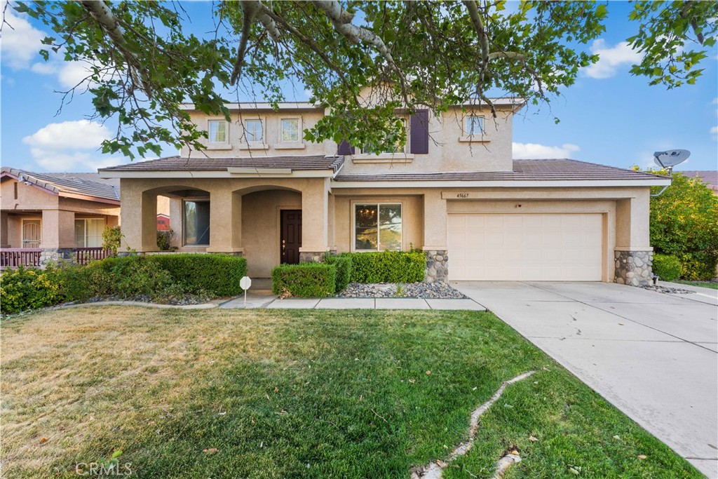 TRUE PRIDE OF OWNERSHIP! This beautiful 2 story home is located in a quiet neighborhood in West Lancaster. The functional floor plan offers 5 bedrooms, 3 full baths and 2,860 square feet of living space! Family room with a rock fireplace, upgraded laminate flooring, entertainment nook and a mounted 55'' TV with soundbar (included in the sale). The kitchen has gorgeous Corian countertops, a large breakfast bar, 2 storage pantries and a dining area. BONUS ROOM currently being used as a formal dining room with fine finishes including a stunning chandelier, crown molding and chair rails. The HUGE primary retreat offers a private en suite bath with 2 walk-in closets, dual vanity sinks and a separate shower & tub. Upstairs LOFT provides a cozy living space and desk area! Other features include a DOWNSTAIRS BEDROOM and full bath, a formal living room, upstairs laundry room (washer & dryer included), upgraded ceiling fans throughout 2 car attached garage and possible RV access. The spacious backyard has a covered patio, large grass area, block wall fencing and mature landscaping providing shade and a TON of privacy. Speaking of privacy...no rear neighbors EVER!
