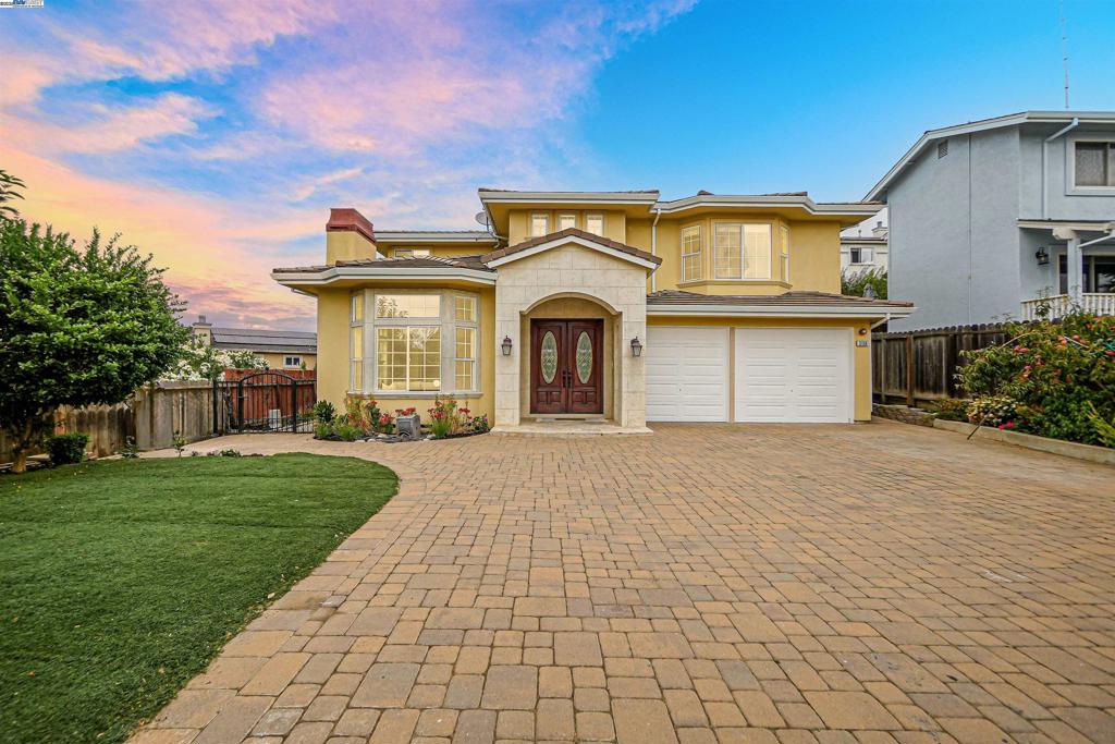 Welcome to 5158 Proctor Rd, Castro Valley. A stunning 5-bed, 4-bath custom-built home offering 3,214 sq.ft. of thoughtfully designed living space. Tucked away on a private flag lot, this residence combines elegance, comfort, & convenience in one perfect package. Step inside to soaring ceilings, a formal living & dining area, ideal for entertaining. The expansive chef’s kitchen features ample counter space, premium appliances, and an open layout that flows seamlessly into the spacious family room. A full bedroom and bathroom on the main level provide the perfect setup for guests or multi-generational living. Upstairs, you’ll find four additional bedrooms, including two with ensuite baths. The luxurious primary suite boasts breathtaking views, a spa-inspired bathroom, & a generous walk-in closet. A versatile flex space upstairs offers endless possibilities—home office, study area, or media lounge. Fresh interior paint and beautiful hardwood floors throughout elevate the home’s timeless style. Enjoy a large 2 car garage & easy access to the outdoors—walk to Proctor Elementary, explore Ten Hills Trail to Lake Chabot, or play a round at Redwood Canyon Golf Course. Conveniently located near downtown, freeways, and BART, this home is perfectly positioned for both relaxation & commuting.