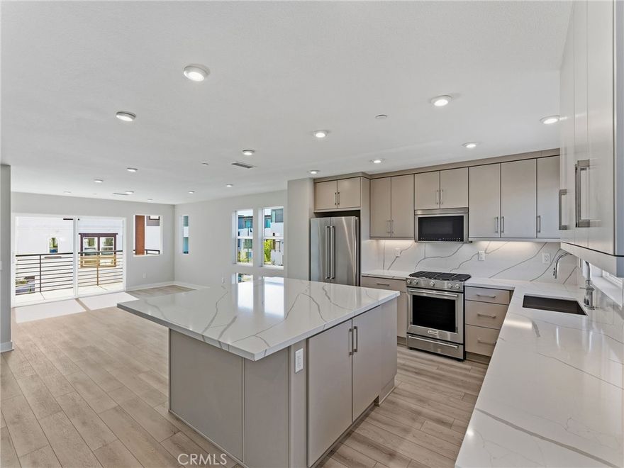 Final opportunity for a Brand-New highly upgraded Toll Brothers Luxury Condo with Owned Solar at Mira Vista!  Homesite 106 is a new construction home that is primely located in Bay Park.  The C5 floorplan- largest of all home designs offered at Mira Vista features 4 bedrooms with one full bedroom and bath on the first floor, with 3.5 bathrooms, exceptionally large 2nd floor balcony as well as huge first floor patio and is 1,795 sq. ft, with a 2-car garage. This amazing floorplan offers floor to ceiling window that allows the natural sunlight to illuminate the well-designed interior living space. As you enter the home, you will be greeted by a highly sought after ensuite with private walk-in shower. The 2nd floor living area features a spacious chef’s kitchen with a massive center island. The kitchen opens to the spacious entertaining Dining room with large expansive great room.  There is a spacious functional covered deck off the great room which combines indoor and outdoor living San Diego is so well known for. The 3rd floor is comprised of a large primary bedroom suite and has a large walk-in closet. The secondary bedrooms are on the opposite end of the home making this home perfect for functionality. Laundry closet features a brand-new Whirlpool washer and dryer. Highlights of the home include upgraded whole house Plato cabinets with upgraded pulls including interior drawer package, upgraded full slab quartz counters in high grade Aviana quartz  in kitchen with full backsplash, upgraded designer tiling in primary shower wall and floor, brand-new full-size Whirlpool stacked washer and dryer, KitchenAid stainless steel appliances, high-end upgraded luxury vinyl plank flooring on main living areas and upgraded carpet, tankless water heater, owned solar, electric car charging outlet, additional electrical throughout and interior insulation package are just some of the many included options built into the price of this home.   Homesite 636, is ready to close.  Don’t miss this opportunity for substantial savings on a Brand-New Luxury Condo with warranties!