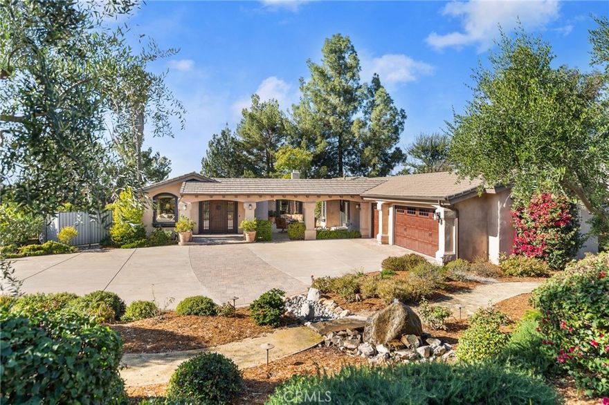 This could be Redlands' deal of the decade and it's golf cart close to the Redlands Country Club. Features include a gourmet kitchen, 3 good sized bedrooms one of which is being used as an office, custom cabinetry and built-ins, french doors, power shade window treatments, private pool and 2 gorgeous water features, low maintenance drought tolerant landscape with a covered pergola patio and spa with a conversation area. One of the most unique features of this home is the atrium next to the entrance. Schedule you private tour of this wonderful home soon because, as they say, it won't last long.