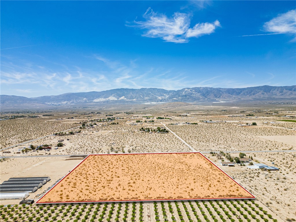 Unlock the potential of this rare 10-acre vacant parcel, APN: 0450-025-31-0000, San Bernardino County, located just off paved Rabbit Springs Road, perfectly positioned on the east side before entering the Town of Apple Valley. This flat, developable land is adjacent to an active crop farm, offering a golden opportunity for agriculture, homesteading, or long-term investment in one of Southern California’s most historically significant farming regions.
Lucerne Valley is widely recognized for its rich agricultural heritage, especially its thriving alfalfa industry - the crop so central to the area it shares its name. Alfalfa grown here is used for grazing, hay, silage, green manure, and cover cropping. In addition to alfalfa, the valley also supports a variety of other crops including apple orchards, vegetable gardens, cabbage, cannabis, cantaloupes, and eggplants. With optimal growing conditions, this property is well-suited for both experienced farmers and those looking to start a new agricultural venture.
The land itself offers ample sun exposure, open skies, and flat topography, making it ideal for expanding or launching a commercial farming operation. Its proximity to paved Rabbit Springs Road ensures convenient year-round access, while its location near the Town of Apple Valley provides nearby amenities without sacrificing the peace and privacy of rural living.
Zoned Lucerne Valley Rural Living (LV/RL) which allows multiple uses, this parcel offers flexibility for those looking to cultivate crops, raise livestock, build a homestead, or simply invest in the future of high desert agriculture. Whether you envision a bustling farm or a serene ranch, this land is a blank canvas ready to bring your vision to life.
Don’t miss this unique chance to own a significant piece of California’s agricultural heartland. Contact us today for more details or to schedule a private tour of the property.