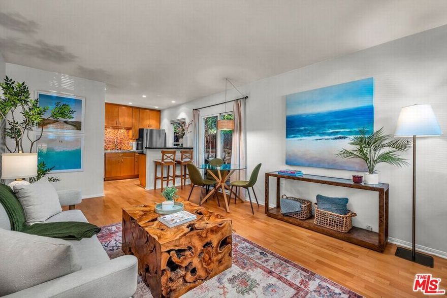 In the heart of Santa Monica, this boutique Mid-Century modern building, built in 1963, offers just six residences. Unit #1 is a stylish ground-floor home featuring a private entry patio framed by lush landscaping. Inside, enjoy a light-filled open floor plan with newly buffed and coated wood floors, fresh paint, double-pane windows, and a convenient breakfast bar. Sliding doors off the living room open to a fenced outdoor patio, ideal for lounging or entertaining. This complex has no pet restrictions. Additional features include tandem parking for two cars, extra storage, and the flexibility to add in-unit laundry (per HOA). With a Walk Score of 90 and a Bike Score of 96, you're just moments from the beach, vibrant restaurants, cafes, and nightlife along Santa Monica Boulevard. Whether as your own coastal retreat, an income property, the HOA has no rental restrictions, and low HOA dues. This home captures the very best of Santa Monica living.