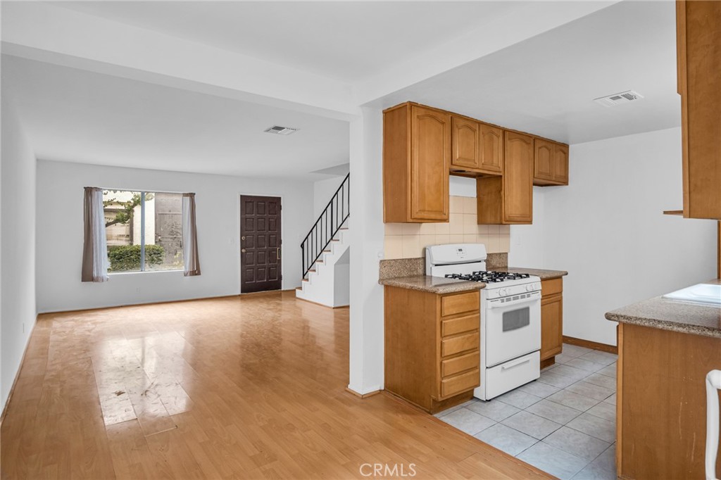 Welcome to 318 E Broadway #2, a beautifully refreshed 2-bedroom, 1-bath condo in the heart of San Gabriel. This charming home The spacious living area flows seamlessly into the dining space, creating an inviting atmosphere for everyday living and entertaining.
Step outside to your private back patio, perfect for morning coffee or evening relaxation. The home also includes a 1-car garage plus an additional parking space, providing convenience and value that’s hard to find at this price point.
Both bedrooms are generously sized with ample natural light, while the updated bathroom adds a modern touch. The home offers excellent livability with clean finishes and move-in ready condition—ideal for first-time buyers, downsizers, or investors.
Conveniently located near shopping, dining, schools, and the San Gabriel Mission District, this property combines comfort and accessibility in one of San Gabriel’s most desirable neighborhoods.