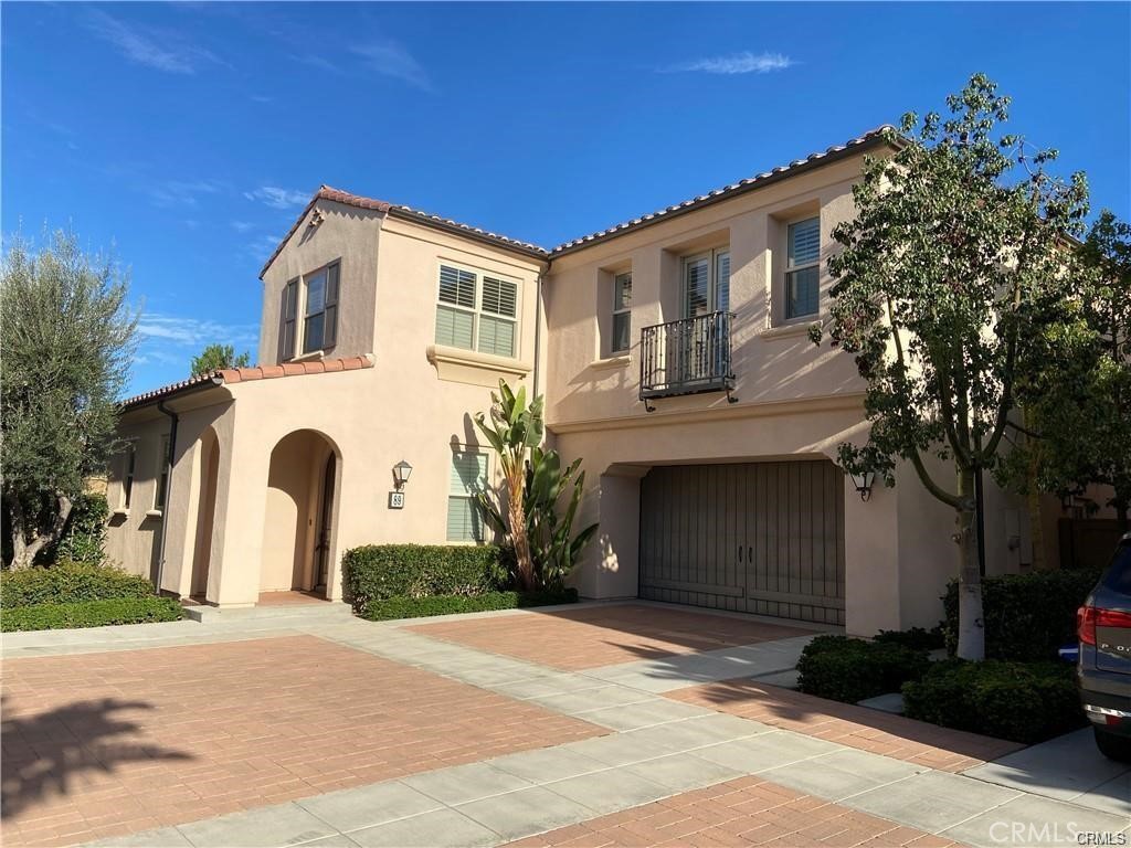 Stunning Home in Cypress Village | Top-Rated Irvine School District. Welcome to this exceptional 4-bedroom, 3.5-bathroom home nestled in the highly sought-after Cypress Village community, part of the award-winning Irvine Unified School District. This thoughtfully designed residence features two master suites—one conveniently located on the main floor and a primary master suite upstairs. The first floor boasts elegant wood flooring, plantation shutters, and a spacious open-concept layout. The gourmet kitchen includes stainless steel appliances, a gas cooktop, and a walk-in pantry—perfect for both everyday living and entertaining. A built-in tech center with dual desks offers a functional workspace ideal for remote work or study. Retreat to the luxurious master suite with a generous walk-in closet, spa-like soaking tub, and walk-in shower. Located within walking distance to top-rated Cypress Village Elementary and Jeffrey Trail Middle School, this home offers unparalleled convenience in a vibrant, family-friendly neighborhood.
