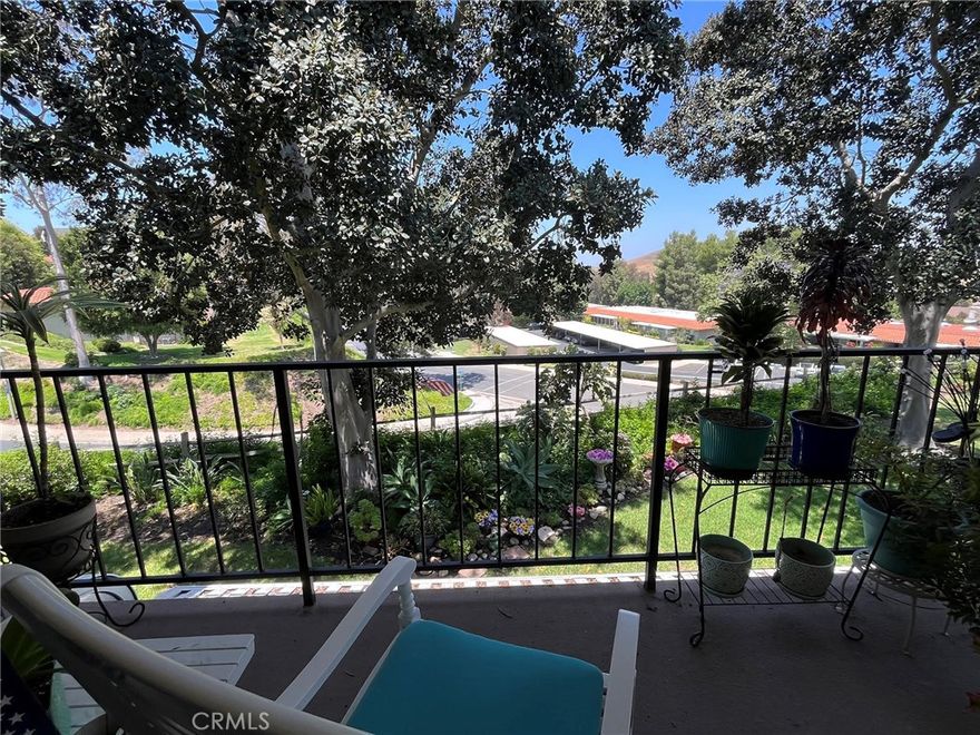 Welcome to Algarrobo! This nicely updated condo is located in one of the most highly desired senior communities in Orange County! This charming two-bedroom, two-bathroom condominium is situated on a single-loaded street surrounded by lush landscaping and boasts newer stainless steel appliances in the kitchen, along with updated flooring throughout the kitchen and bathrooms. This peaceful retreat offers a tasteful, neutral palate allowing its next lucky owner to easily make it their very own. Laguna Woods Village is a beautiful, twenty-four-hour guard-gated community providing unparalleled resort-style amenities to it's residents. Voted "Best Senior Living Community" by the Orange County Register, those who get to call it home enjoy the use of 5 pools, 4 hot pools, 7 clubhouses, 3 fitness centers, 10 tennis courts, 7 pickleball courts, 2 professional golf courses, an equestrian center, a performing arts center featuring an 814-seat theatre, and much more!!! Resident classes, continuing educational opportunities, and more than 200 active clubs will ensure that life here in Laguna Woods Village will benefit your mind, body, and spirit. Community transportation services offer a variety of options to meet your needs, whether you're partaking in onsite activities, running errands, or looking to venture out for a day of fun. This is more than a home, it's a lifestyle! Don't miss the opportunity to call this home!