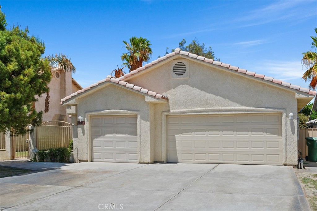 This spacious 4-bedroom, 3-bath home in the Panorama neighborhood of Cathedral City offers over 2,500 square feet of comfortable living on an 8,276 square foot lot. Inside, the high ceilings create an open, airy feel, with both a formal living room and a separate family room providing flexible living spaces. The large kitchen has generous storage and layout options for everyday cooking or entertaining. Recent updates include a new HVAC system (2022), swamp cooler service (2023), newer water heater (2019), and fresh roof maintenance. The backyard is a great space with plenty of potential to make it your own. Located in a quiet, established area close to schools, parks, shopping, and freeway access—this home offers space, comfort, and convenience in a prime location. Don’t miss the opportunity to see it in person.