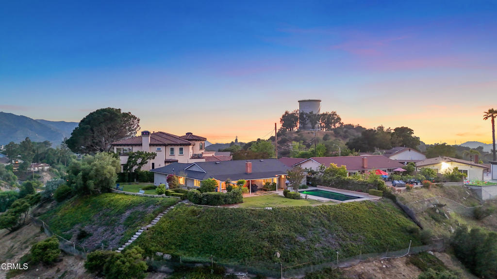 BEST VIEWS IN THE SAN FERNANDO VALLEY!!! Welcome to 9670 Crystal View Dr., a peaceful 3-bedroom, 2-bathroom hillside retreat in the scenic and prestigious Crystal View neighborhood of Tujunga. This +/-1,771 sq ft home is perfectly perched on a massive lot to capture breathtaking canyon and mountain views from nearly every room. Uniquely distinguished, this property was hand-selected by the original developer as the site for his own personal residence--underscoring its exceptional location.Inside, soaring ceilings and expansive picture windows flood the open-concept layout with natural light. The updated kitchen features luxury European ROHL fixtures, a SHAW ceramic farm sink, a 2024 WOLF dual-fuel gas range with grill, and an Italian-made ELICA hood with dual motors--perfect for the home chef.The bathrooms are equally refined, with matching ROHL fixtures, another SHAW ceramic farm sink, and an all-marble primary bath. The primary walk-in closet features organic natural wool carpeting, and luxury custom blackout shades ensure restful sleep.Step outside to your private backyard oasis, where a sparkling Pebble Tec pool, sun-drenched patio, and citrus trees await. Enjoy your morning coffee or sunset swims while taking in panoramic mountain and city views--all with no freeway noise, a rare luxury for view homes in the area.Additional highlights include newer retractable screen doors, multiple outdoor living spaces, an attached 2-car garage, and close access to hiking trails. This one-of-a-kind property offers the ultimate blend of comfort, nature, and refined California living.