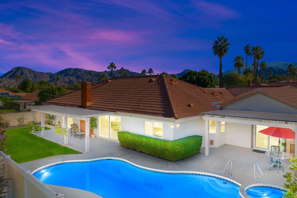 A genuine SHOWSTOPPER! The home has been impeccably cared for. Three car garage, pool & spa and a lovely landscaped front and back yard. This home boasts a newer kitchen, newer windows and sliders, newer HVAC, newer flooring and a beautiful and private back yard with two patios along with newer Aluma wood awnings perfectly suited for quiet relax time or even fun entertainment with friends and family! The property has panoramic mountain views surrounding the home. Majestic bliss best describes this home! A peaceful neighborhood with no HOA fees. Just a short distance to the wonderful restaurants and shopping on the beautiful street of El Paseo. This home is an enchanting paradise! Staged Furnishings.
