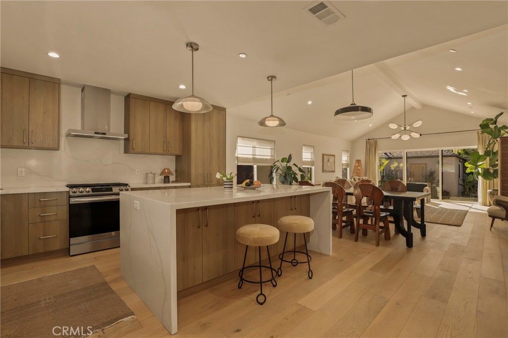 Photo of 3715 Hillcrest Drive, Los Angeles, CA 90016 (MLS # SR26054843)