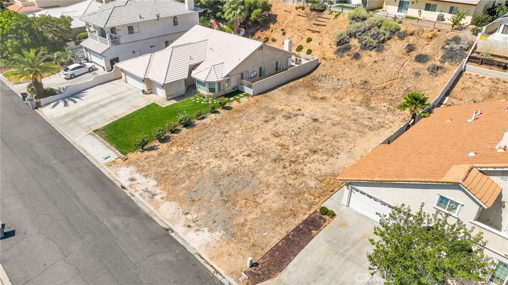 Build Your Dream Home or Invest on this 7,200 Sq Ft Lot in Spring Valley Lake. Situated at 13610 Sierra Vista Dr, this prime lot is located in one of the High Desert’s most desirable communities, giving you the opportunity to build a custom dream home or an investment property. Enjoy optional access to top-tier amenities—golf course, private sandy beach, boating, fishing, tennis courts, exclusive country clubs, and community events. The lot sits in a highly convenient location, just minutes from shopping centers, restaurants, schools, and with easy freeway access for a smooth commute. Don’t miss this opportunity!