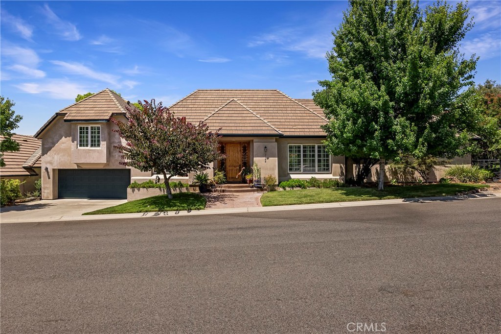 Welcome to 3188 Wood Creek Dr! This beautifully maintained 4-bedroom, 3-bath, 2,572 sq ft residence is nestled in one of the most sought-after neighborhoods—the gated community of Canyon Oaks in The Fairways. Step inside to polished concrete floors and a bright, welcoming atmosphere. With just one owner, this home is truly move-in ready, allowing you to settle in and start enjoying your new space right away.
The spacious primary suite features a luxurious soaking tub and a walk-in shower with dual shower heads—perfect for unwinding after a long day. The cozy living room includes a wood-burning fireplace, ideal for staying warm during the winter months.
Upstairs, you'll find two additional bedrooms and a full bathroom—one of the bedrooms even has its own private balcony, offering a perfect spot to relax with a morning coffee.
The drive-thru garage provides convenient access to the golf course—perfect for heading out with your golf cart. Out back, you'll discover a fully equipped outdoor kitchen, making it an ideal space for entertaining or enjoying peaceful evenings with a view.
Don't miss the chance to own this exceptional home in Canyon Oaks. Come take a look—you won’t want to leave!