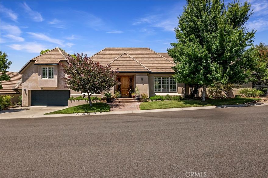 Welcome to 3188 Wood Creek Dr! This beautifully maintained 4-bedroom, 3-bath, 2,572 sq ft residence is nestled in one of the most sought-after neighborhoods—the gated community of Canyon Oaks in The Fairways. Step inside to polished concrete floors and a bright, welcoming atmosphere. With just one owner, this home is truly move-in ready, allowing you to settle in and start enjoying your new space right away.



The spacious primary suite features a luxurious soaking tub and a walk-in shower with dual shower heads—perfect for unwinding after a long day. The cozy living room includes a wood-burning fireplace, ideal for staying warm during the winter months.



Upstairs, you'll find two additional bedrooms and a full bathroom—one of the bedrooms even has its own private balcony, offering a perfect spot to relax with a morning coffee.



The drive-thru garage provides convenient access to the golf course—perfect for heading out with your golf cart. Out back, you'll discover a fully equipped outdoor kitchen, making it an ideal space for entertaining or enjoying peaceful evenings with a view.



Don't miss the chance to own this exceptional home in Canyon Oaks. Come take a look—you won’t want to leave!