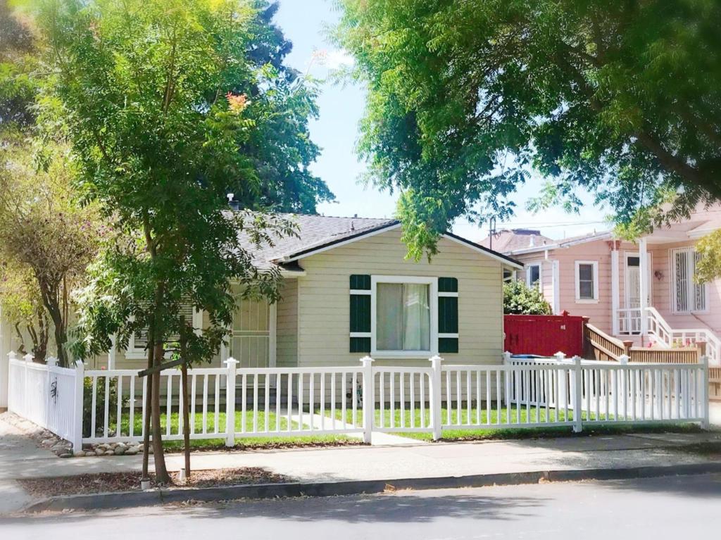 This quaint Carmel Cottage has its original charm and updated features. The house is tastefully decorated and ready for the new owner to move in. New laminate wood plank in most areas. Remodeled kitchen with shaker cabinets and quartz countertop. Enjoy very quiet and private backyard with shade in the evening hours. New sod in front lawn surrounded by white fences. New flower & vegetable bed and a pond in back yard. Within 4 miles of job centers such as Apple campus, Nvidia camps, and future Google campus. Enjoy after work life with Santana Row, Valley Fair, Cupertino Main street, Santa Clara Square, Costco, Home Depot which are all minutes away. Your little ones will surely enjoy the expansive playground in the Fremont park.