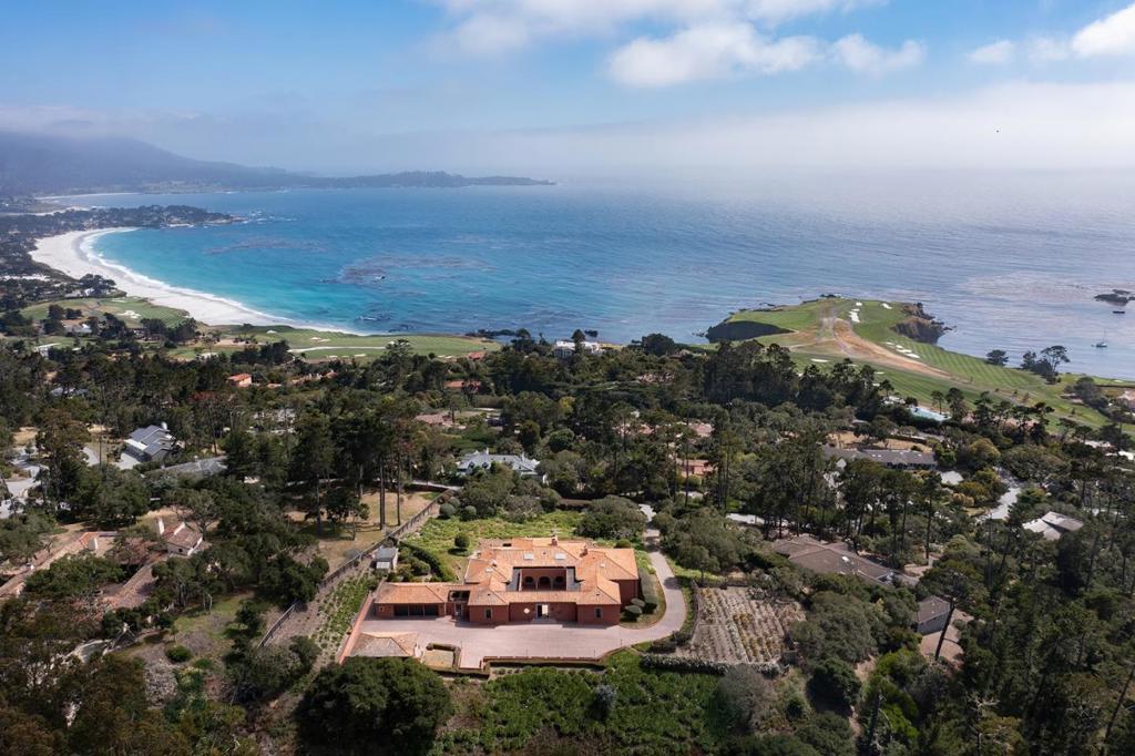 Located in Pebble Beach's prestigious Del Monte Forest, 3190 Del Ciervo is a true-to-form Palazzo estate with sweeping views, exceptional privacy, and timeless elegance. Just up the hill from The Lodge and Beach & Tennis Club, this property blends grandeur and opportunity. High ceilings and custom tilework create dramatic, light-filled interiors. A classic rose garden and mature landscaping surround the home, offering serene natural beauty. Enjoy panoramic vistas from nearly every room, with a layout ideal for both entertaining and everyday living. With its premier location and architectural scale, this home presents rare potential for customization or a full-scale remodel. Experience the history, prestige, and lifestyle of Pebble Beach from one of its most sought-after addresses.