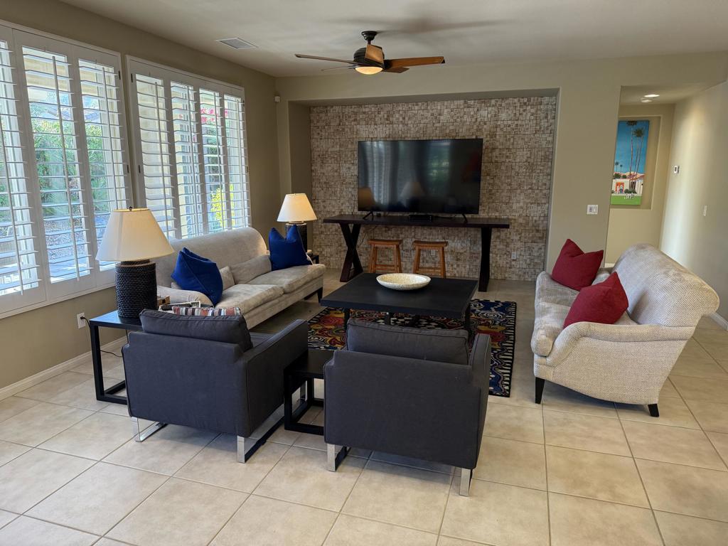 Trilogy is a gated 55 and older community with a beautiful 18 hole golf course. Clubhouse facilities include gym, pickleball, tennis, Bocce ball, Arts and crafts room, card room . This property has a casita with it's own entrance Private bath with a shower. 3 bedrooms 3 baths. Home has an above spa with private backyard. You can be as busy as you want or just relax and enjoy the sunshine. You won't be disappointed in the home or the community. This home is available for all months.