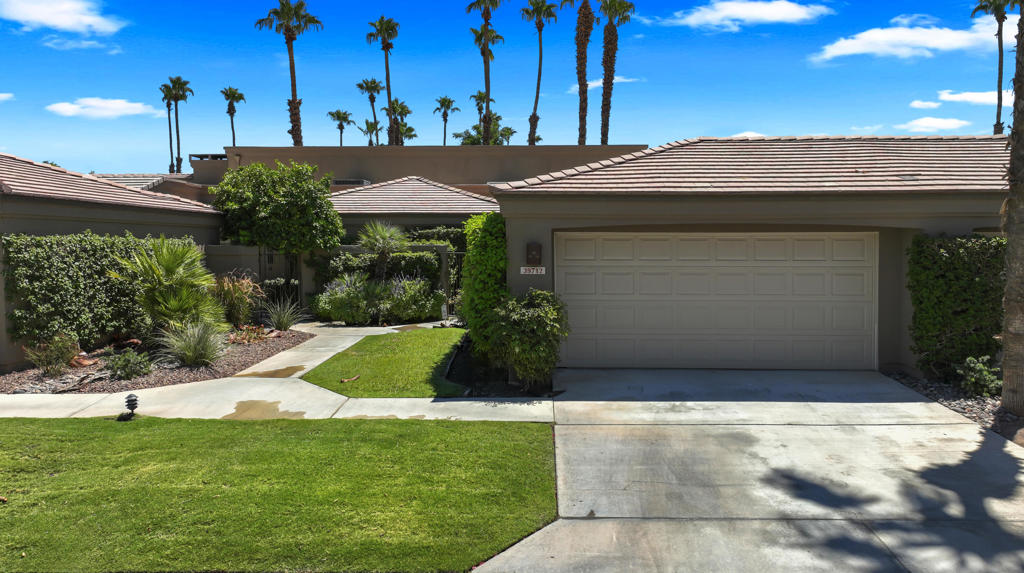 Welcome to Your Desert Oasis in Palm Valley Country Club! 🌴✨This spacious and sun-filled Jacaranda floor plan is ready for its next chapter! Whether you're looking for a full-time residence, seasonal escape, or investment opportunity, this home offers incredible value, stunning views, and a vibrant lifestyle that only Palm Valley can deliver. Freshly painted throughout, this unit has been professionally cleaned, updated with new lighting, new doors and switches, and is priced to allow the next owner to bring their vision to life. It's move-in ready with great bones, but also offers the perfect blank slate for a kitchen remodel or interior upgrades if you wish to make it your own. From the moment you walk through the gated front courtyard, you'll feel the charm of this desert gem. Step inside to a bright and open living space with vaulted ceilings, large tile flooring throughout, and expansive sliding glass doors that frame the spectacular golf course, lake, and mountain views -- it's truly a postcard-perfect setting.Both bedrooms are generous in size, with ample closet space and direct access to the outdoor patio. The primary suite with dual sinks, a walk-in shower.🌅 The Patio: Your private patio is the ultimate spot for morning coffee or evening cocktails with friends. Watch golfers pass by, palm trees sway in the breeze, and the desert sky transform at sunset. And don't forget -- one of Palm Valley's 42 pools is just a short stroll away!🛠️ Updates Already Completed:Fresh Interior PaintNew Lighting Fixtures & SwitchesProfessional Cleaning Throughout🌴 Why You'll Love Living at Palm Valley Country Club:Two 18-hole golf courses designed by Ted Robinson (no initiation fee!)100,000+ sq ft Clubhouse with full-service bar, restaurant, and events16 tennis courts, an incredible Pickleball program, and on-site pro shop42 pools & spas throughout the communityFull gym, spa, hair salon, massage & wellness servicesDozens of social clubs, happy hours, and community eventsFriendly, welcoming neighbors and a vibrant community atmosphere. Located in beautiful Palm Desert.
