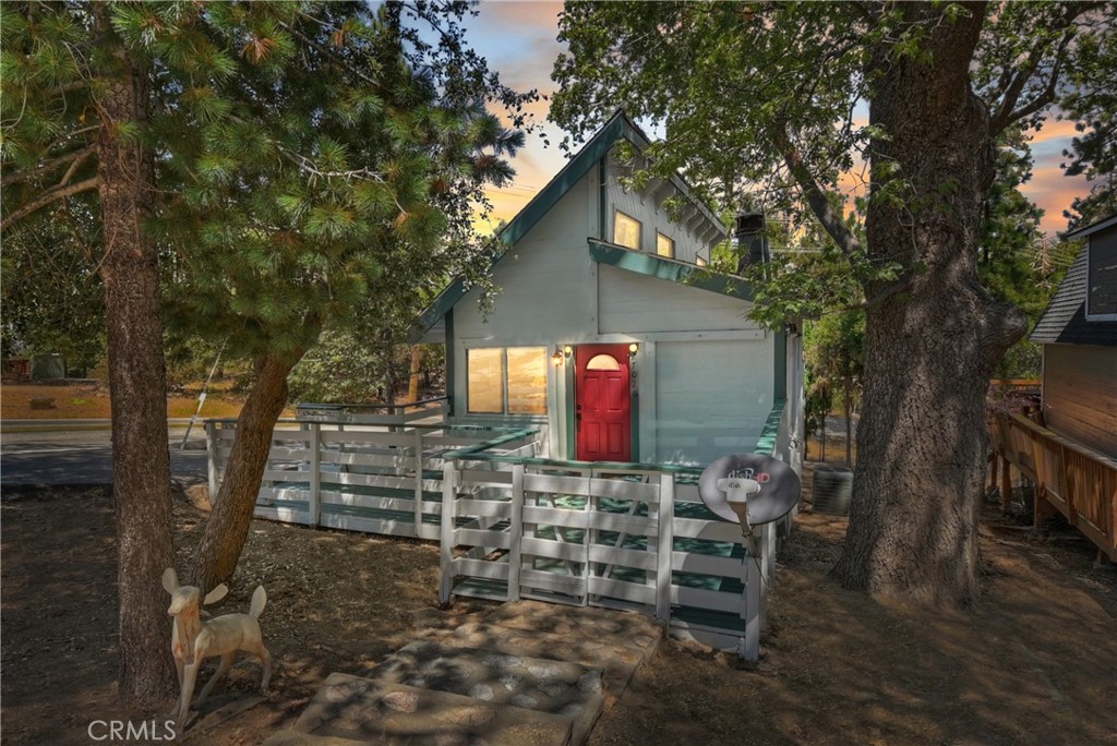 Welcome to this beautifully cared for mountain home, where comfort and convenience meet the great outdoors ~ From the moment you step inside, the home’s character shines with soaring tongue & groove high ceilings that create a spacious, open feel while allowing an abundance of natural light to pour in throughout the day ~ Every corner of this property reflects true pride of ownership, making it move-in ready for its next owner ~ Situated in a prime location with easy access, this home is perfectly positioned for both full-time living and weekend escapes ~ Nature enthusiasts will love being just steps away from the National Forest, where endless ATV trails, hiking, and outdoor adventures are waiting to be explored ~ The exterior of the property is just as impressive as the interior ~ A paved driveway provides plenty of room for multiple vehicles and is large enough to accommodate a boat or RV with ease, ideal for those who want to bring all their toys to the mountains ~ Below the home, a spacious buildup area offers additional storage, perfect for keeping gear, tools, or seasonal items neatly tucked away where you will also find a second bathroom ~ Inside, modern comforts are already in place ~ Stay cool in the summer with air conditioning, and enjoy peace of mind in the winter with a furnace, both are only 5 years old ~ The layout is both practical and welcoming with two comfortable bedrooms with high ceilings making it a great fit for families or a couples weekend getaway ~ Step outside to the back deck, where you’ll find the perfect spot to unwind after a day of adventure ~ You can take in stunning mountain sunsets and enjoy the quiet beauty of your surroundings ~ Best of all, there’s no HOA, giving you the freedom to enjoy your property without unnecessary restrictions, although there are no lake rights ~ Whether you’re searching for a full-time residence, a second home, or an investment property, this home checks all the boxes at the right price.