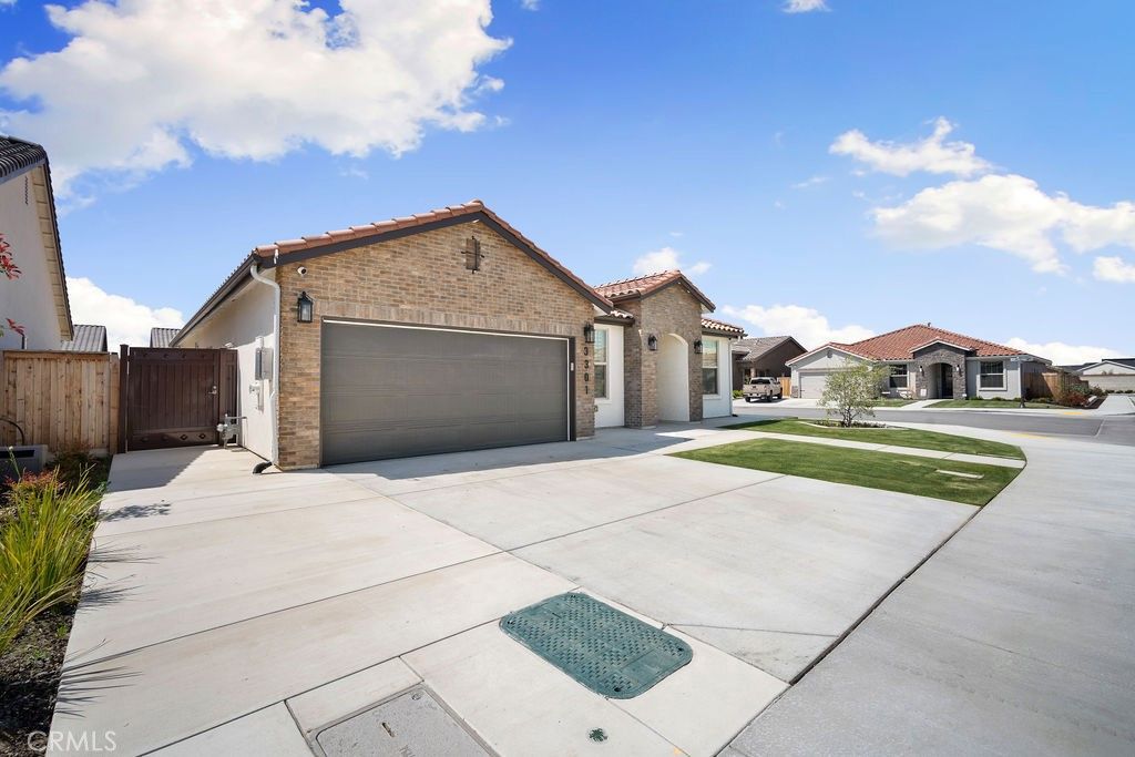 Photo of 3301 Whispering Brook Lane Ln, Shafter, CA 93263 (MLS # NS25219903)