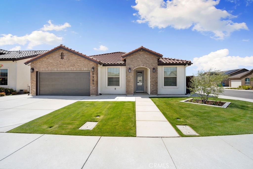 Welcome to this stunning 4 bedroom, 2 bathrooms home perfectly situated on a spacious corner lot. From the moment you arrive, you’ll notice the accent stone wall, stylish block fencing, and added concrete in the front, sides, and backyard—making this property both low-maintenance and eye-catching. Step inside to an inviting spacious kitchen with a center island, ideal for entertaining and family gatherings. The home features tile flooring, plantation shutters, and elegant crown molding for a touch of sophistication. Enjoy the benefits of owned solar for energy efficiency and lower utility costs. The finished garage provides extra comfort and functionality. Outdoors, relax under the extended covered patio complete with outdoor fans and lighting, perfect for year-round entertaining. As part of a wonderful community, you’ll have access to multiple parks and entertainment areas, making it the perfect place to call home.