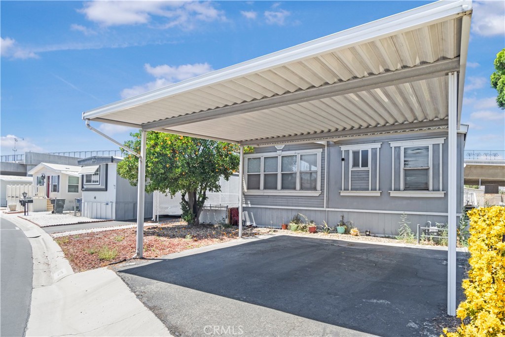 BEST PRICE you will find in this sought-after 55+ community of Mission Village, this 3-bedroom, 2-bathroom manufactured home offers space, comfort, and opportunity. The open floor plan provides a generous living area, complemented by spacious bedrooms and an indoor laundry room for added convenience. While the home could use a little TLC, it’s full of potential to make it your own. Mission Village is centrally located near shopping, dining, and major freeways. Community amenities include a clubhouse with a full kitchen, swimming pool, spa, fitness center, billiards room, and optional RV parking for an additional fee.