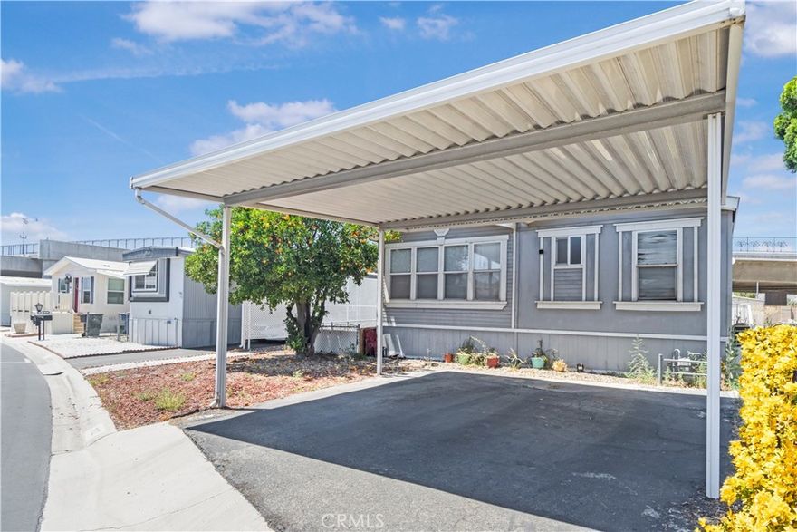 BEST PRICE you will find in this sought-after 55+ community of Mission Village, this 3-bedroom, 2-bathroom manufactured home offers space, comfort, and opportunity. The open floor plan provides a generous living area, complemented by spacious bedrooms and an indoor laundry room for added convenience. While the home could use a little TLC, it’s full of potential to make it your own. Mission Village is centrally located near shopping, dining, and major freeways. Community amenities include a clubhouse with a full kitchen, swimming pool, spa, fitness center, billiards room, and optional RV parking for an additional fee.