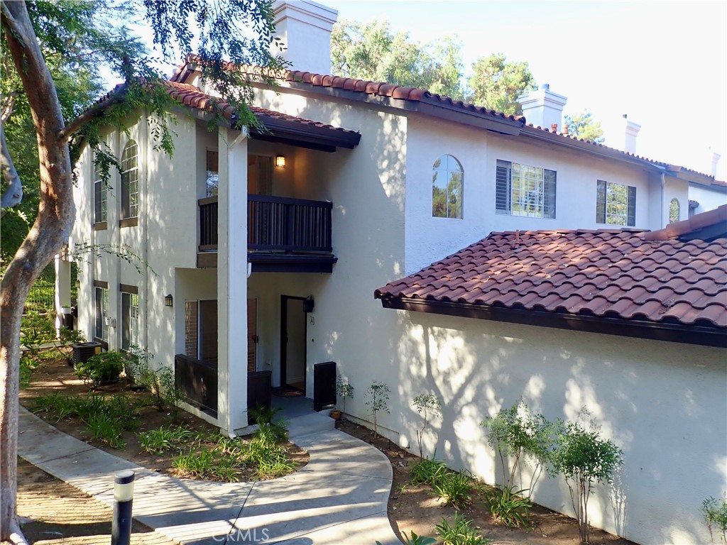 Shadow Oaks 2+2.5 with direct access garage and covered carport #154. Two story Townhome with remodeled interior in the perfect private location away from Kanan Road in the back of the complex next to nature and open space. Shadow Oaks consist of 80 privately owned Townhomes built in 1989 with community pool, spa, gym, and clubhouse. Each upstairs primary bedroom has it's own vaulted ceilings, a walk-in closet, and a full bath. One bedroom includes a covered outdoor balcony. Downstairs guest bath. Living room with gas fireplace, dining area and breakfast bar. Spacious kitchen with hardwood cabinets, stone slab countertops, and all stainless steel appliances including refrigerator. 2 outdoor patio areas downstairs, one is very private between the kitchen and attached garage. Direct access garage with epoxy floor has full size washer and dryer included along with installed electric charger. Covered carport #154 is also included. One year lease (no short term rental) with credit report Fico score above 700. Please no pets. Shadow Oaks is located about 3 miles north of the 101 Ventura Freeway at the Kanan Road exit, 2 blocks past Oak Park High School and directly across the street from the Oak Park Community Center and outdoor park with streams, pond, and hiking trails. Close proximity to the award winning Oak Park Schools of Red Oak Elementary, Medea Creek, and Oak Park High. Water and refuge are paid by owner.