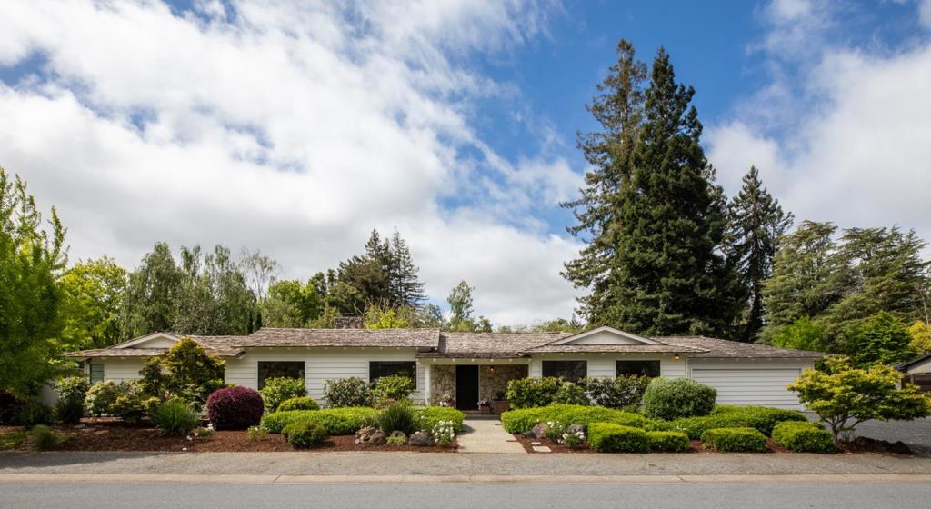 This stunning residence is situated on a rare sprawling 15,008 square-foot lot in a tranquil cul-de-sac and has a thoughtfully designed flexible floor plan with 3 bedrooms, 2 full baths and 2 half baths. One of the secondary bedrooms is easily big enough for two children and one day, with its built-in bookcases, it could serve you as a fantastic library and home office. The primary suite, located on the opposite side of the home from the secondary bedrooms, offers the perfect private retreat. You'll relish waking up to picturesque garden views, while the suite itself features a sprawling bathroom and an abundance of closet space so you can shop without worry. The magic of this property unfolds as you step outside into the beautifully landscaped gardens. Designed to cater to the entertainer in you, the expansive lot is large enough to accommodate a pool, sports court, and much more, making this residence a haven for outdoor gatherings and celebrations. Easily walk to Sacred Heart Schools, Menlo School and Menlo Park City Schools. Don't miss this rare opportunity to own a piece of paradise in one of the most sought-after neighborhoods in the bay area.