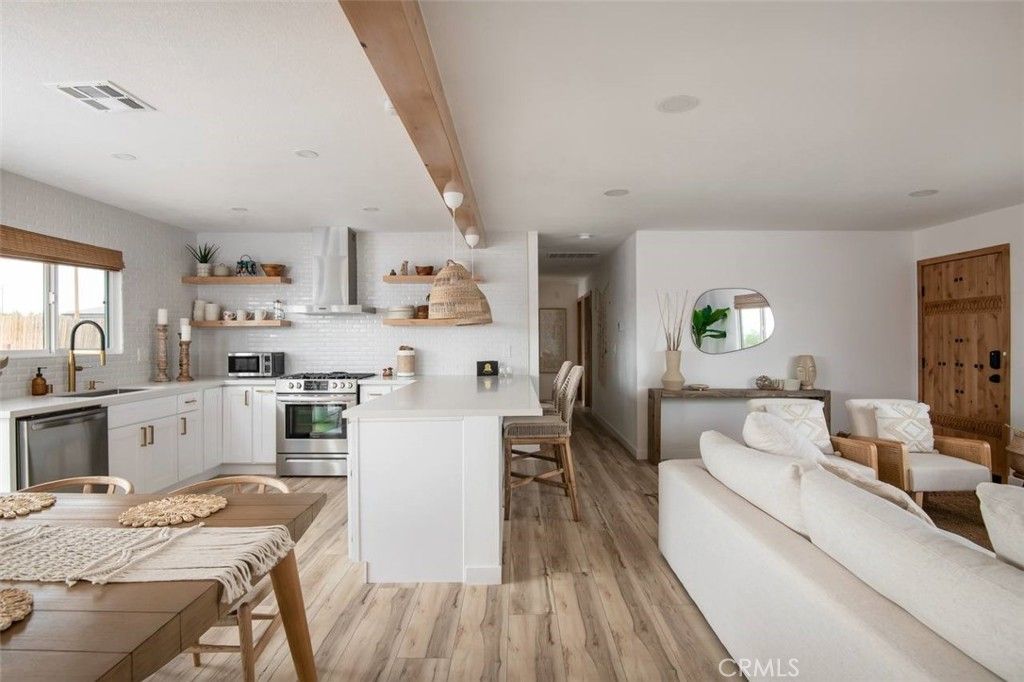 Photo of 57783 Saratoga Avenue, Yucca Valley, CA 92284 (MLS # OC26066860)