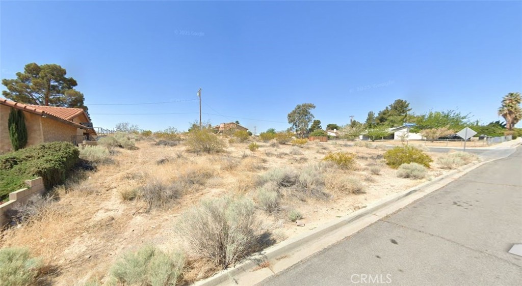 Prime Corner Lot in Green Tree East – Build Your Dream Home! This spacious ?-acre lot sits on the southeast corner of Brentwood and Baywood in the desirable Green Tree East neighborhood of Victorville. With a gentle slope ideal for maximizing panoramic desert views, it’s the perfect spot to build without compromising your sightlines. Enjoy a peaceful, established area surrounded by custom homes and quick access to open desert at the end of the street—ideal for outdoor enthusiasts and those craving space and serenity. Near amenities, commuting options. Utilities available.