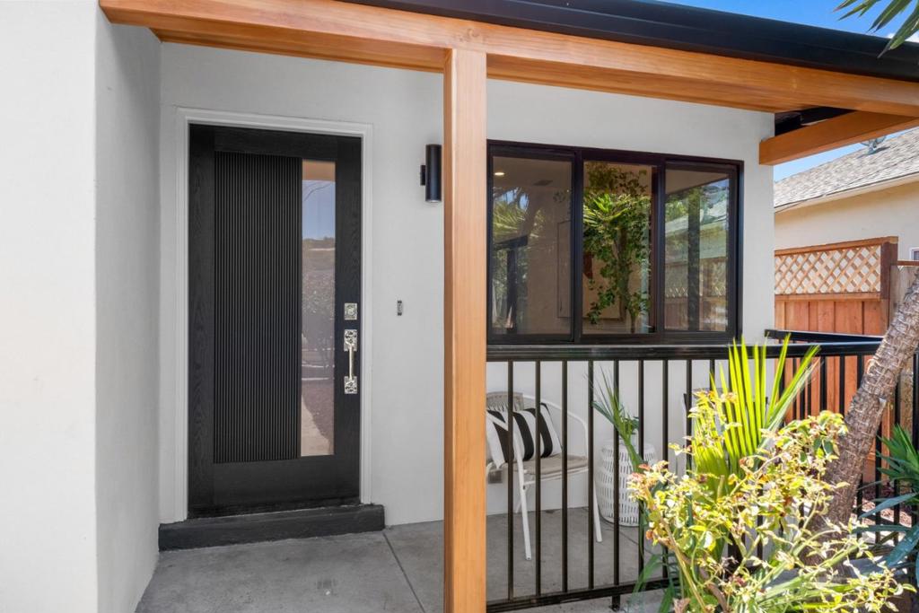 Welcome to this beautifully updated 3-bedroom, 2-bathroom home nestled in the heart of East Palo Alto. With its crisp curb appeal, fresh landscaping, & inviting front porch, this single-level home blends stylish living w/comfort & convenience. Step inside to an open-concept living space where abundant natural light, warm wide oak look LVP, & contemporary finishes create a sophisticated atmosphere. The living room flows seamlessly into the dining area & airy kitchen outfitted w/quartz countertops, shaker-style cabinetry, stainless appliances, & a large picture window offering views. The spacious primary offers a private retreat w/an updated en-suite bathroom, while 2 additional bedrooms share a chic, spa-inspired bath w/floor-to-ceiling tile & a deep soaking tub. Each room is thoughtfully designed for both function & relaxation. Step out to the fully fenced backyard, where a generous patio & mulched landscape provide room for entertaining, gardening, or play. A highlight is the mature loquat trees. Additional features include a glass front door, NEST thermostat, recessed lighting, dual-pane windows, & an attached 2-car garage with space for ADU. Located near major commuter routes, tech campuses, & local parks, this turnkey home is the best of peninsula living.