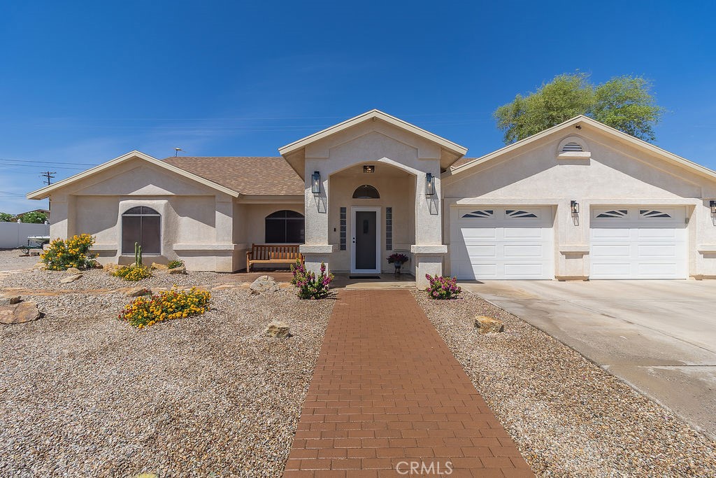 Stunning Three Bedroom Home with RV Parking and Spacious Floorplan
Welcome to your dream oasis in beautiful Needles, California! This exceptional three-bedroom, two-bathroom home features a spacious open floor plan that is perfect for both relaxation and entertaining. Each generously sized bedroom is complemented by a walk-in closet, ensuring that you have all the storage space you need.
At the heart of this home is a large kitchen that will delight any home cook. It boasts a convenient breakfast bar for casual dining and a dedicated desk space, perfectly suited for meal planning or remote work. With ample counter space and modern appliances, this kitchen is as functional as it is inviting.
You'll love the seamless flow of the living areas, highlighted by stylish tile and laminate floors throughout. The indoor laundry room adds a touch of convenience, making chores a breeze.
Set on an oversized lot, this home features beautifully landscaped grounds that enhance its charm and appeal. The three-car, boat-deep garage offers abundant space for vehicles and watercraft, while the dedicated RV parking and hookups cater to your adventurous lifestyle.
Located just moments away from the stunning Colorado River, you can enjoy a wealth of outdoor activities at your doorstep. Don’t miss out on the opportunity to own this beautiful home that seamlessly blends comfort, style, and functionality. Schedule your private tour today and make this wonderful property yours!