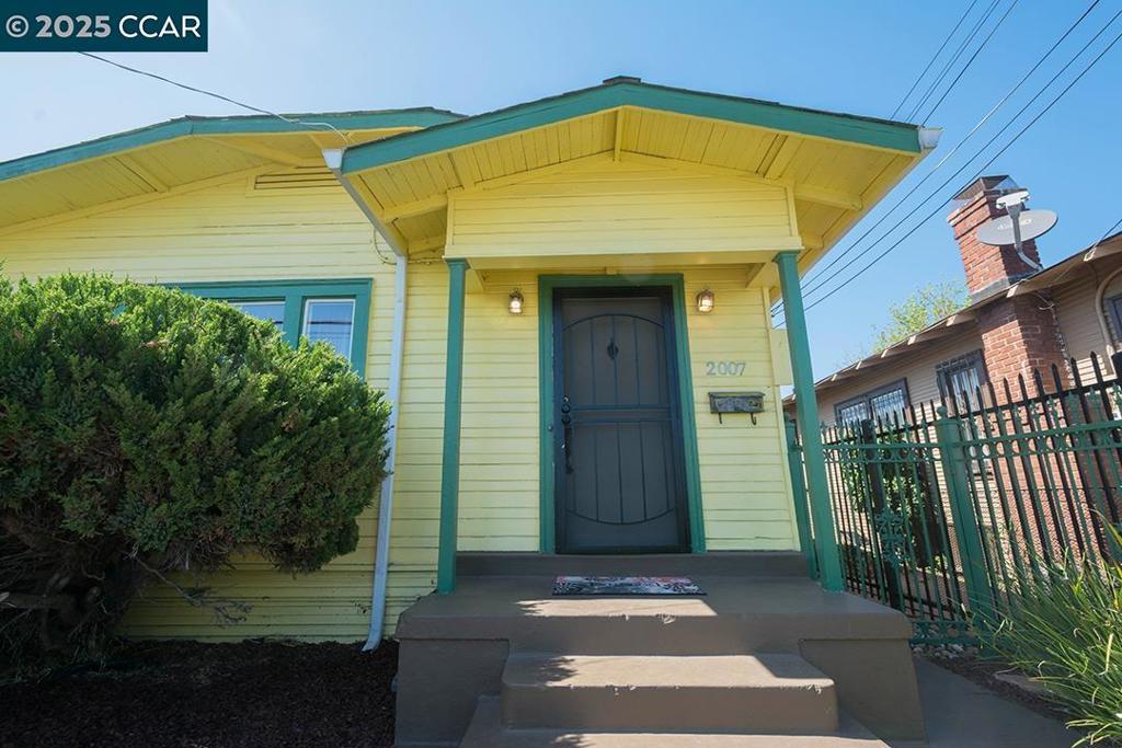 The Vibrant 2 Houses on 1 Lot! The FRONT home offers a spacious 2-bedroom, 1-bath layout featuring gleaming floors and a generous living area that radiates warmth and natural light. The REAR unit has a stylish loft-like feel with 1 bedroom & 1.5 baths, and its own private entrance—perfect for flexible living arrangements or additional rental income.**Eligible buyers MAY QUALIFY for up to 5% in DOWN PAYMENT ASSISTANCE through the GSFA Platinum Program** Whether you're an investor seeking dual rental streams or a homeowner looking to live in one unit and rent the other, this property offers incredible potential. Both units will be delivered vacant at close of escrow, giving you the freedom to select your own tenants OR create a "Multi-generational" setup. Additional features include garage parking, an extended driveway for multiple vehicles, and clear pride of ownership throughout. Ideally located near BART, major freeways, the Oakland ferry, and just a short commute to San Francisco. Enjoy easy access to parks, shops, and local eateries! Own a piece of the Bay Area—that is a smart & secure investment! Live boldly and invest wisely! Here is your chance!!