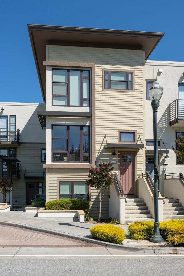 Flooded with natural light from expansive windows, this spacious corner unit offers 4 bedrooms, 4 bathrooms, and approximately 2,454 sq. ft. of thoughtfully designed living space. Built in 2017, the home features sleek architecture and an open concept layout ideal for todays lifestyle. The chefs kitchen is a centerpiece with a six burner gas range, quartz countertops, custom cabinetry, and an oversized island perfect for entertaining. The retreat style primary suite includes a walk in closet and spa inspired bath, while additional bedrooms, including a convenient downstairs suite, provide flexibility for guests, an office, or playroom. Designer upgrades include white oak floors, custom closets, solar shades, surround sound, built in lighting, and a Nest system. The attached two car garage is finished with epoxy floors and cabinetry, while a tankless water heater and other energy efficient systems ensure modern comfort. Located in the heart of Bay Meadows, this home offers unmatched convenience with coffee shops, dining, and parks just steps away. Residents enjoy 18 acres of green space, playgrounds, community gardens, and bike paths, and close to Whole Foods & Hillsdale Mall. Commuting is effortless with Caltrain and quick connections to Highway 101 and 280.