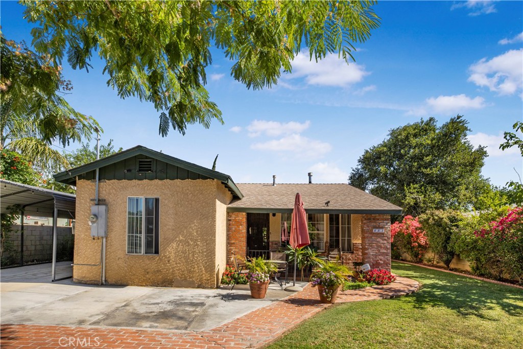 Welcome to 883 W Nicolet St in Banning — a spacious 4 bedroom, 2 bathroom home sitting on a large, beautifully landscaped lot with all the room and charm you’ve been looking for. From mature fruit trees and lush grass to vibrant flowers and thoughtfully curated outdoor spaces, this property feels like your own private oasis.
The updated kitchen features an industrial-style stovetop, upgraded cabinetry, and beautiful countertops — perfect for home chefs and entertainers alike. A custom-built patio with market lighting and handcrafted outdoor furniture makes this a standout space for gathering, relaxing, and enjoying Southern California’s weather year-round.
Storage and utility are dialed in with five 12x10 storage units, a 12x40 ft carport, and ample space throughout the property. The fully fenced yard is surrounded by brick walls and secured with a wrought iron electric gate, offering both privacy and curb appeal.
Conveniently located just minutes from the freeway and downtown Banning, this home is ideal for those looking for space, charm, and functionality in one well-appointed property.
Don’t miss this opportunity to own your own slice of SoCal paradise — schedule your private showing today!