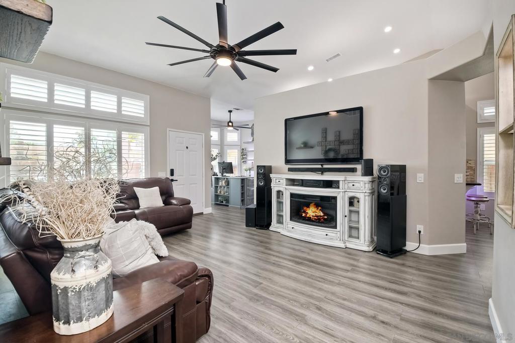 Beautifully updated 4-bedroom, 2-bathroom home located in the highly desirable Lake Rancho Viejo community of South Fallbrook. This move-in ready property features a remodeled kitchen with farmhouse-style cabinetry, granite countertops, stainless steel appliances, and a built-in coffee bar. Vaulted ceilings, plantation shutters, and all-new flooring throughout create a bright, open feel. Built-in hallway cabinets offer extra storage, while the spacious bedrooms and modern bathrooms provide comfort throughout. Enjoy a completely private backyard retreat perfect for entertaining or relaxing. Prime commuter location with easy access to I-15 and Highway 76. Lake Rancho Viejo offers walking trails, parks, and a strong community feel. A perfect blend of style, function, and convenience. Located in a quiet neighborhood surrounded by Fallbrook’s rolling hills and mild climate, this home blends comfort, charm, and quality upgrades. A must-see!